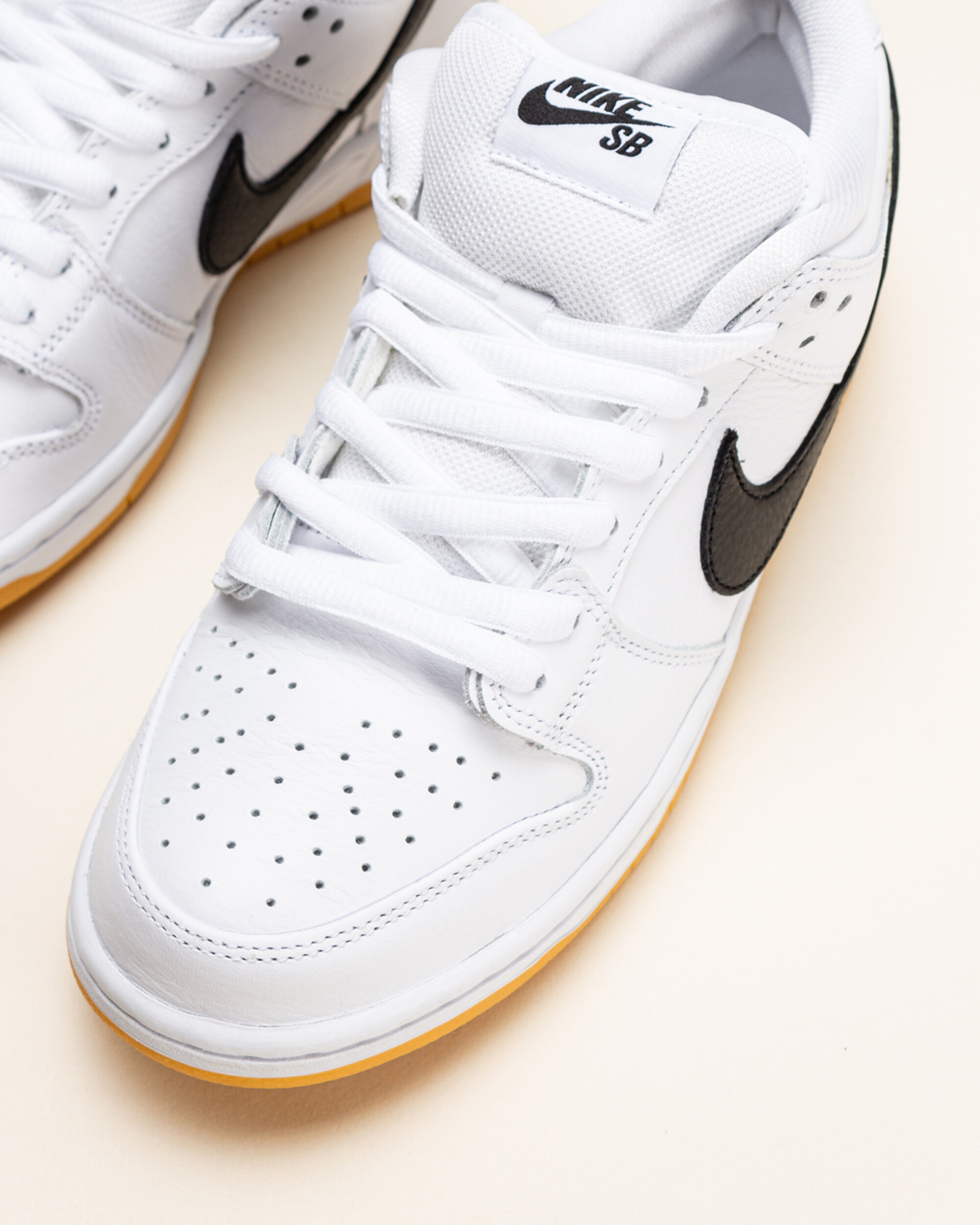 Nike SB Dunk Low Pro - White / Black / Gum Light Brown