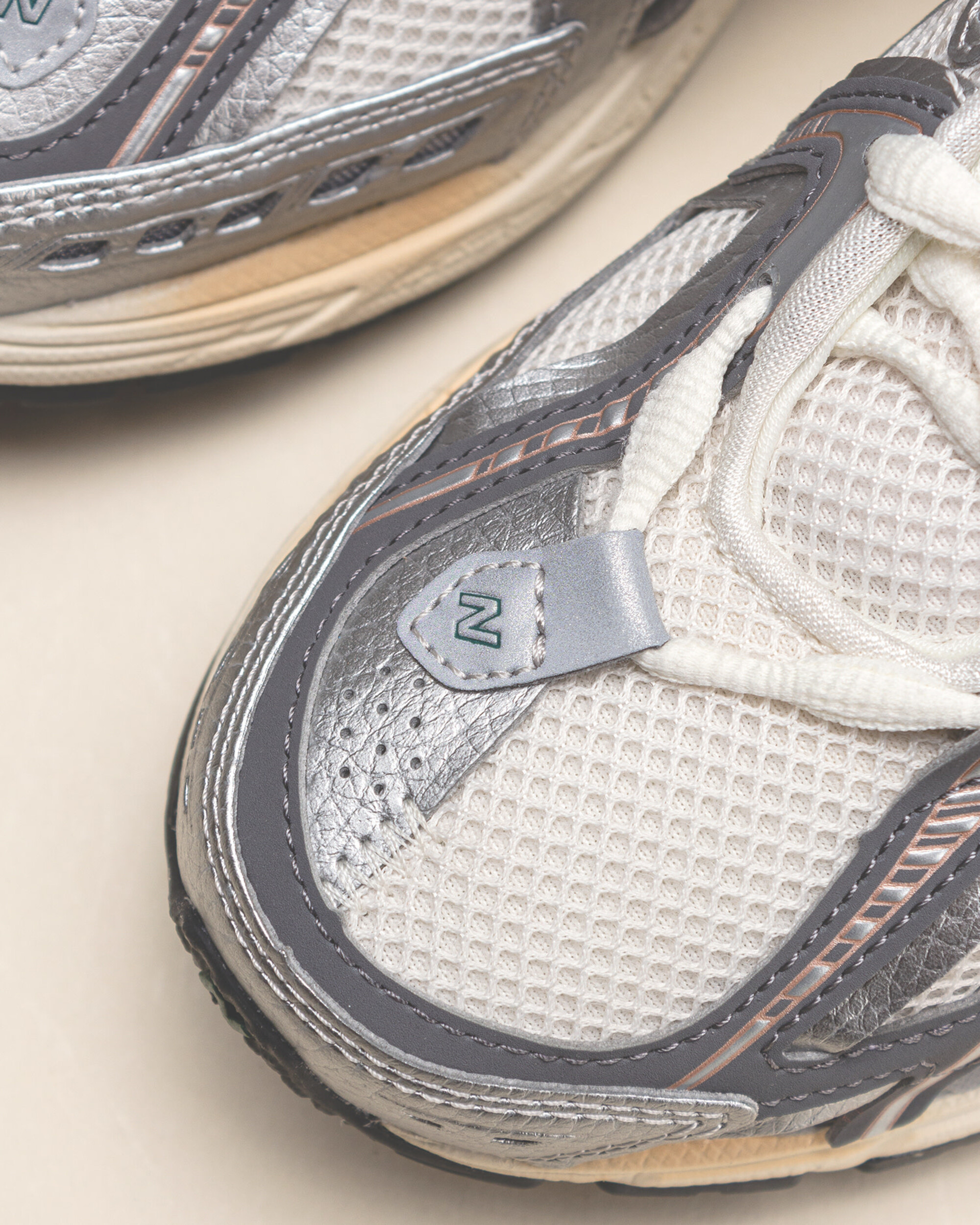 New Balance 1906A - Silver Metallic / Castlerock / Gold Metallic