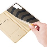 Samsung Galaxy S23 Ultra Slim Bookcase hoesje - Goud