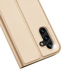 Samsung Galaxy A04s Slim Bookcase hoesje - Goud