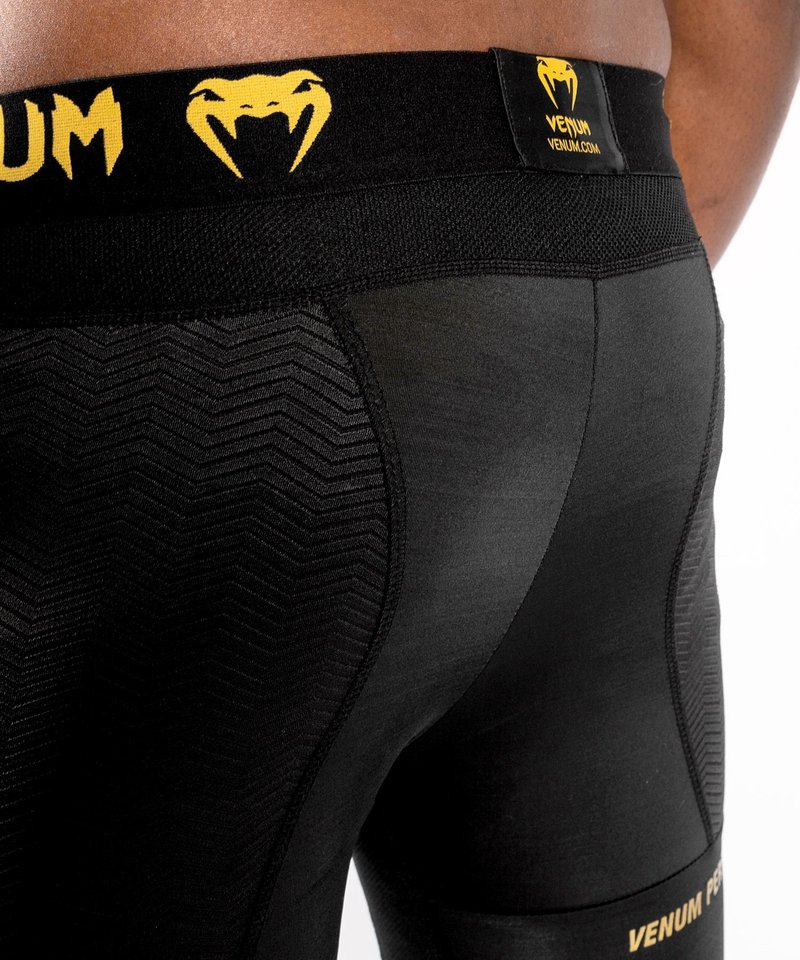 Venum G-Fit Compression Shorts Black Gold - FIGHTWEAR SHOP EUROPE