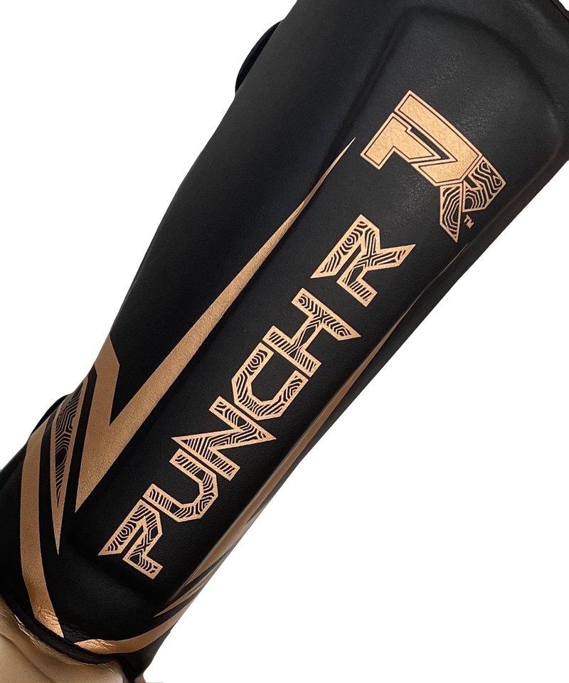 PunchR™  PunchR Electric Kickboxing Muay Thai Shin Guards Black Gold Microfiber