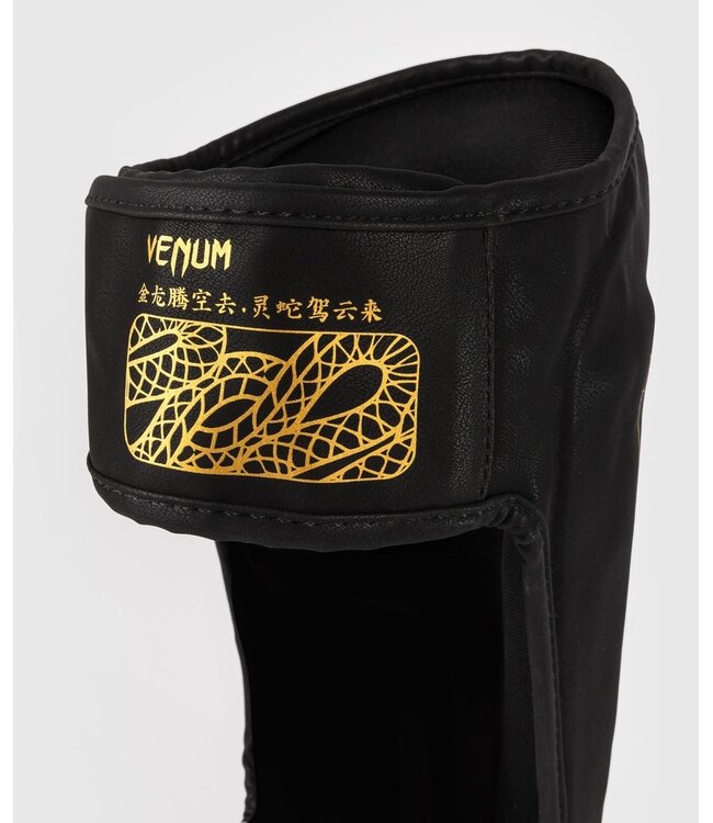 Venum Serpenti Schienbeinschoner Schwarz Silber Gold