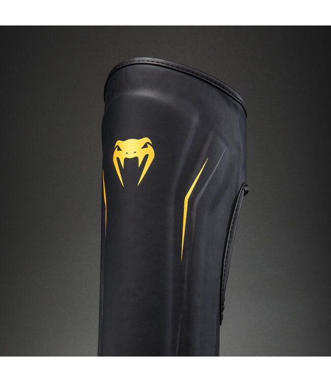 Venum G-Core Schienbeinschoner – Schwarz/Gold für Kickboxen & Muay Thai