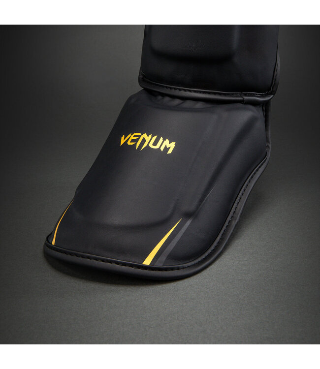 Venum G-Core Schienbeinschoner – Schwarz/Gold für Kickboxen & Muay Thai