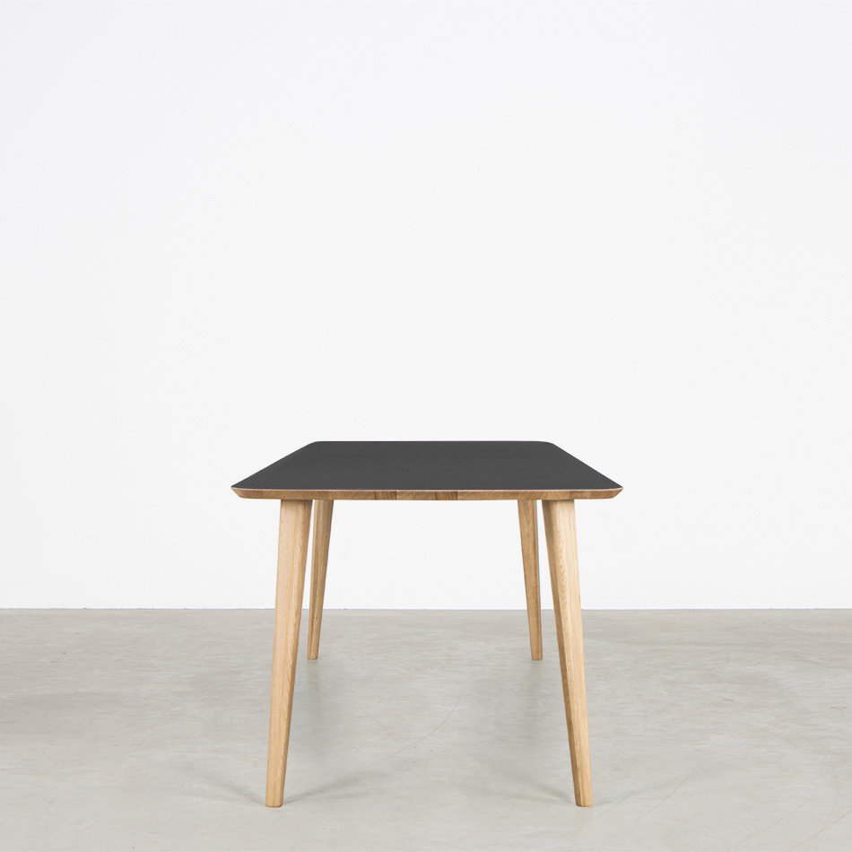 Tomrer Table Black Fenix Top - Oak Legs