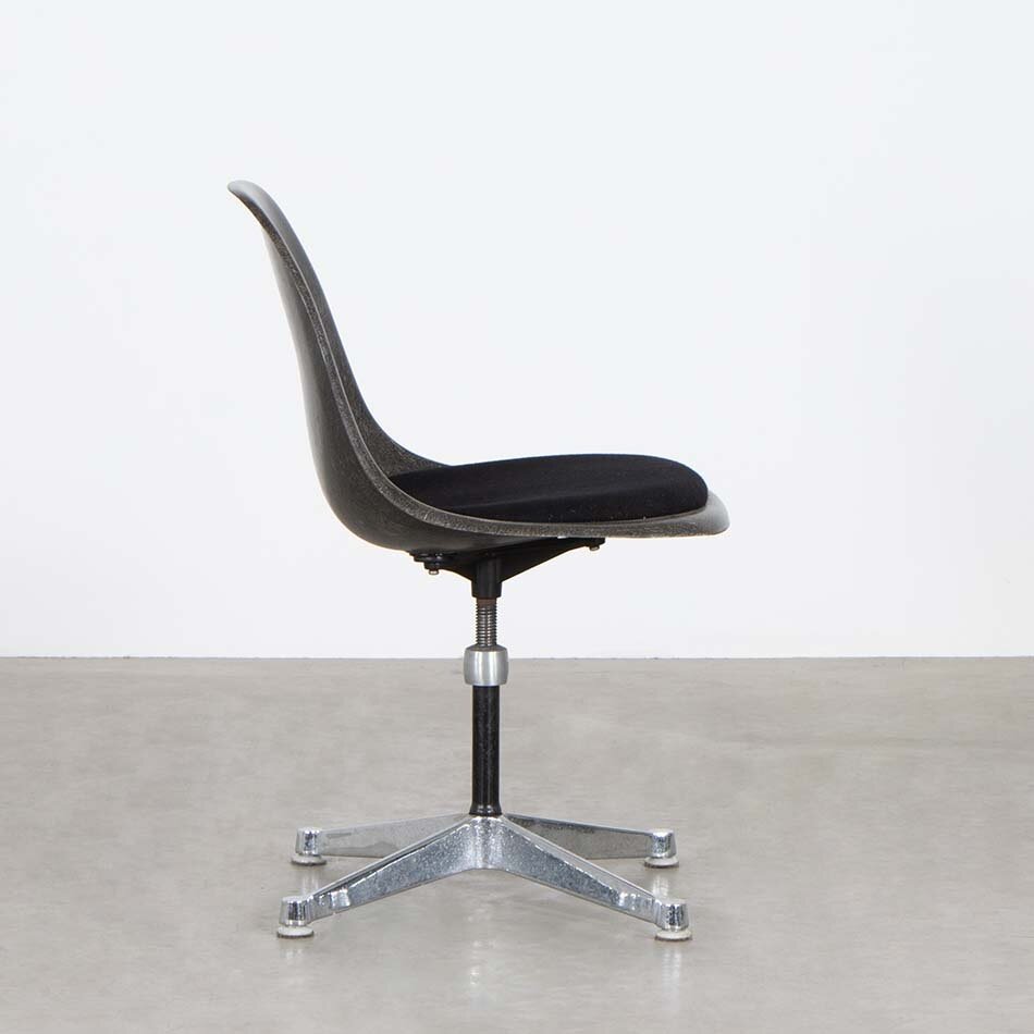 Eames brown fiberglass chair with upholstered seat and height-adjustable swivel leg