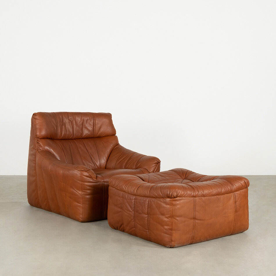 Rolf Benz lounge armchair + ottoman leather