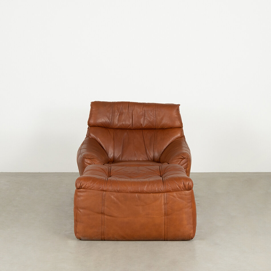 Rolf Benz lounge fauteuil + hocker leer