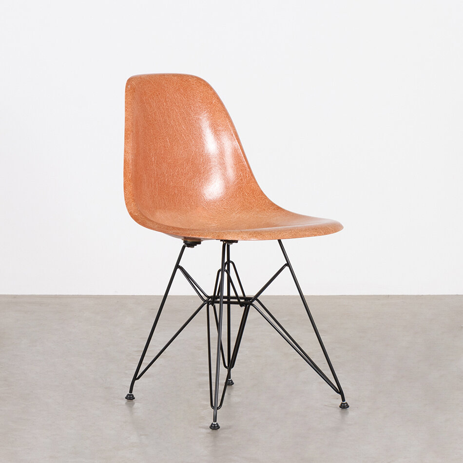 Eames DSR chair orange fiberglass seat Herman Miller