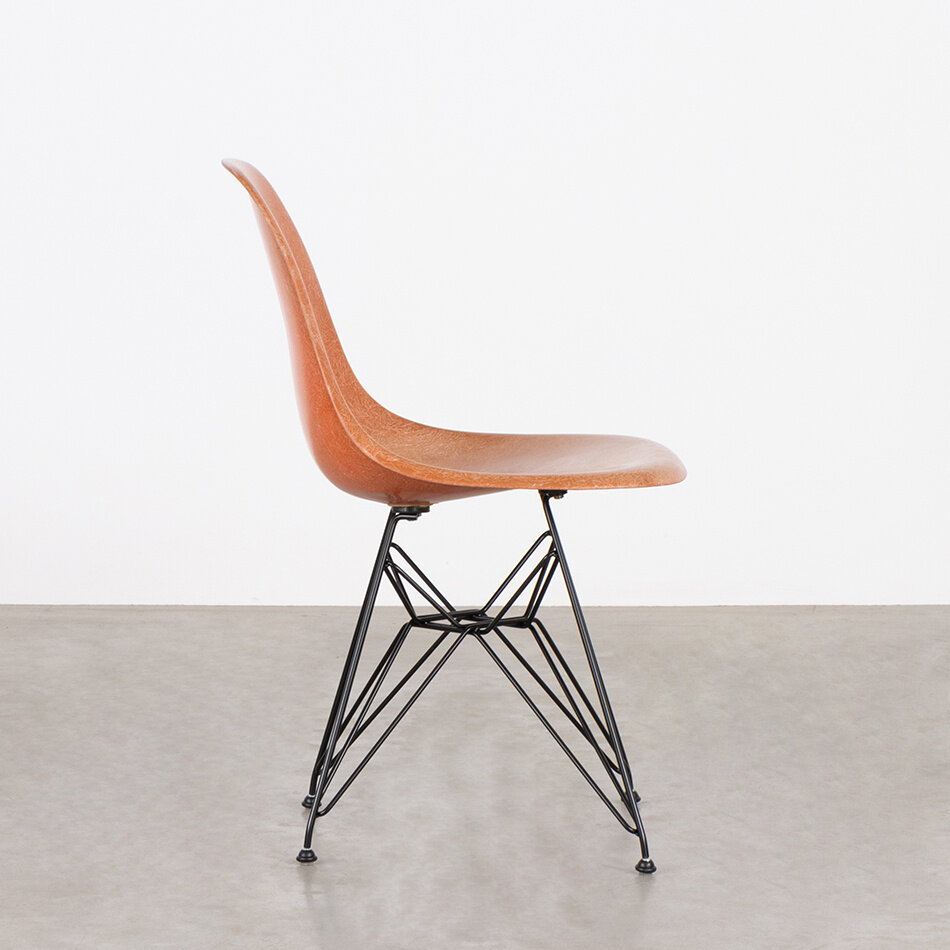 Eames DSR chair orange fiberglass seat Herman Miller