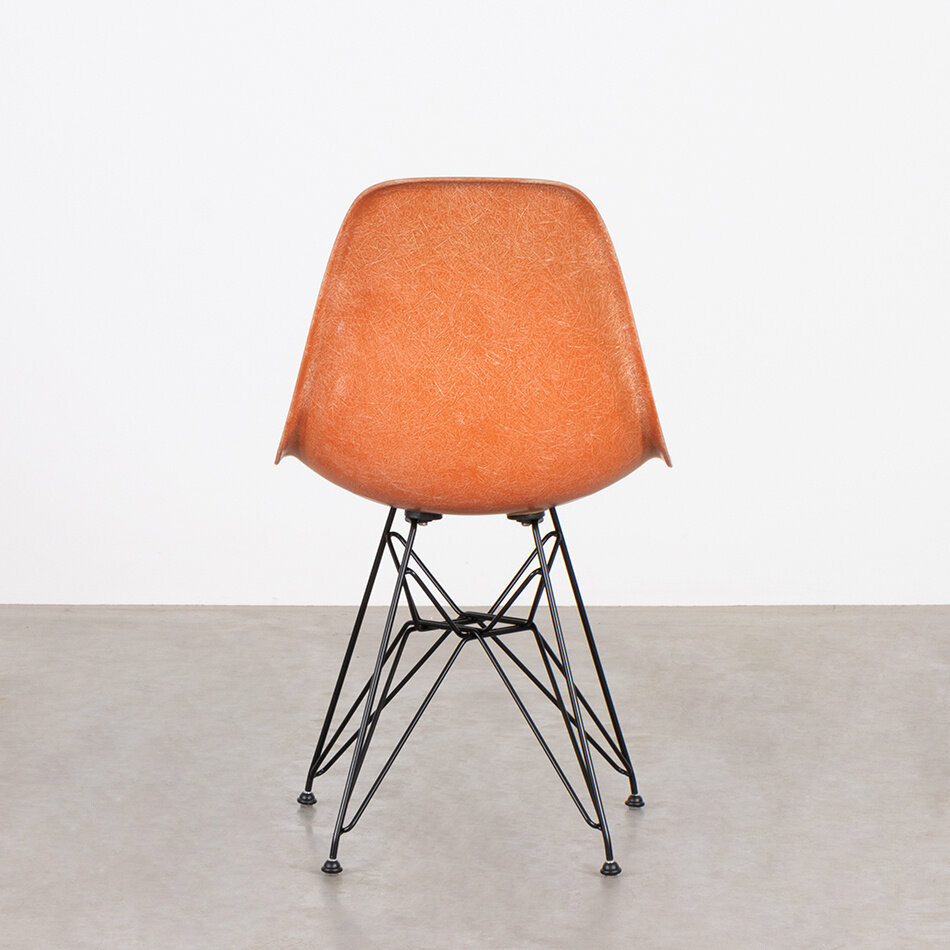 Eames DSR stoel oranje fiberglass kuip Herman Miller