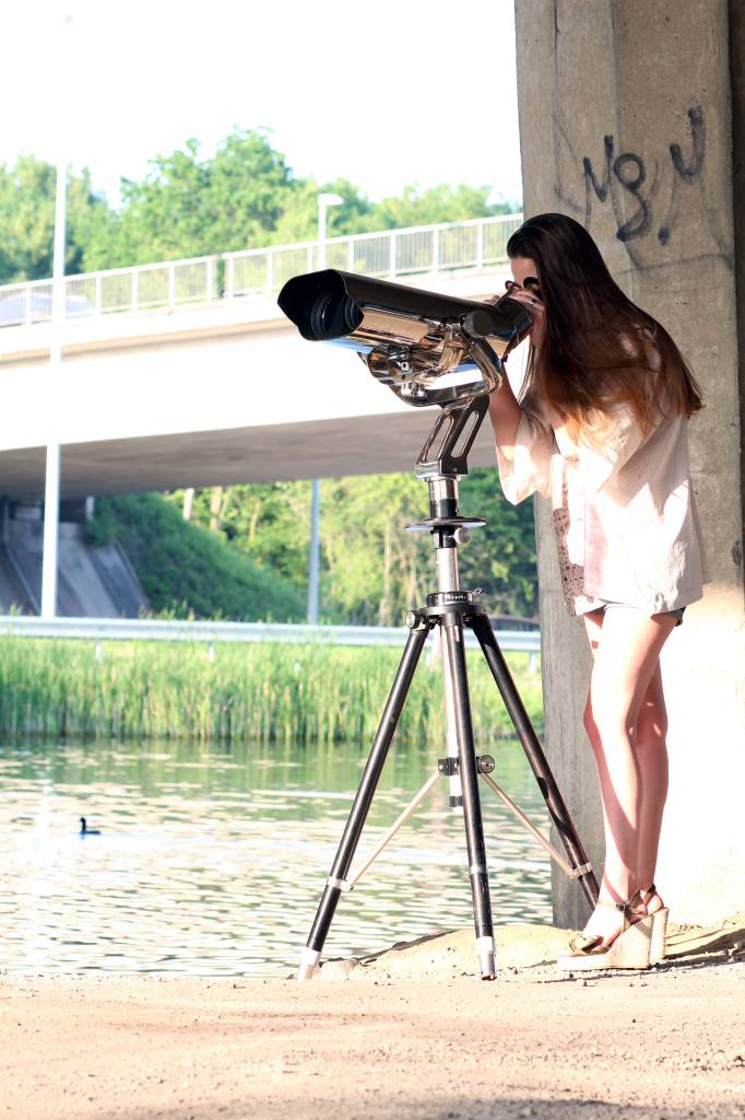 Large binoculars on aluminum tripod