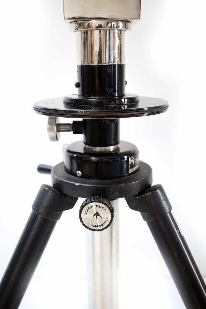 Large binoculars on aluminum tripod