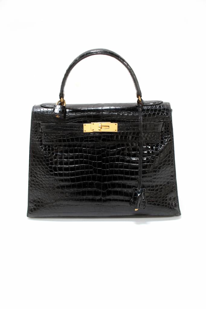 Vintage Hermès Kelly bag and clutch in black croco