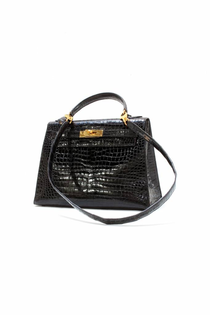 Vintage Hermès Kelly bag and clutch in black croco