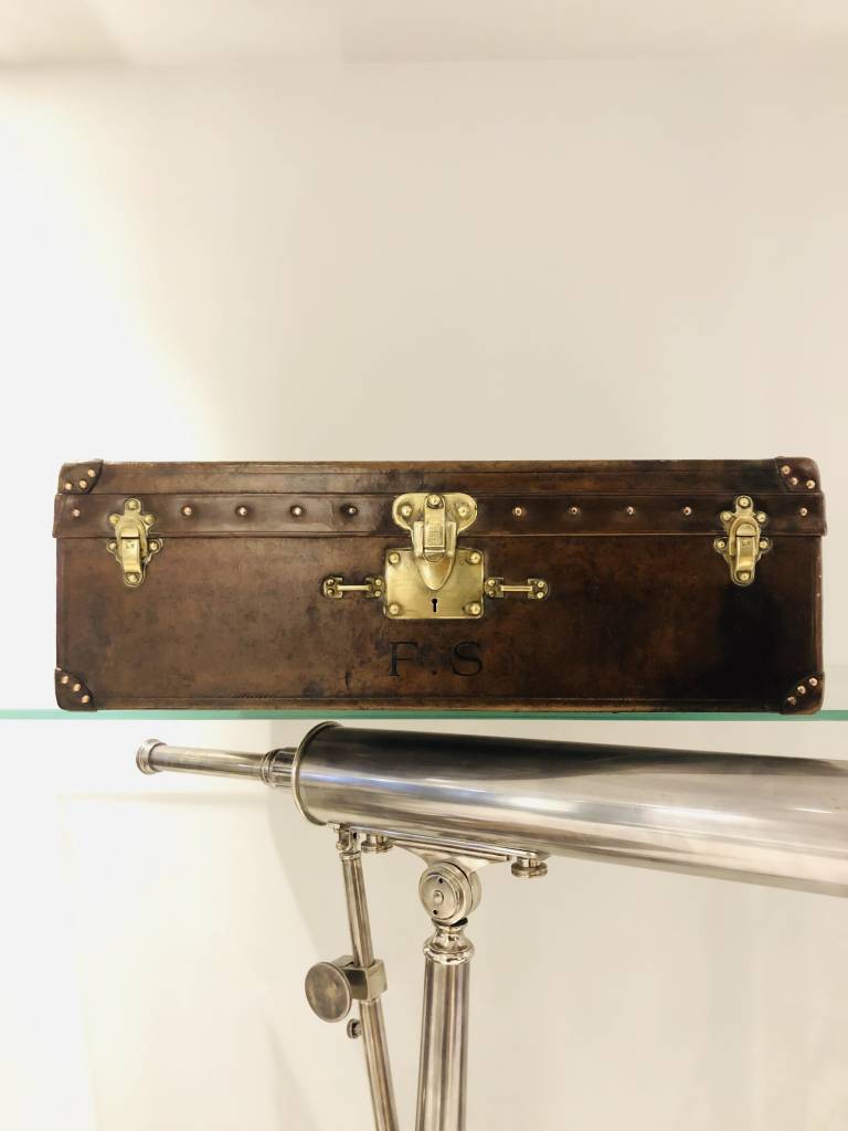 Old leather Louis Vuitton suitcase