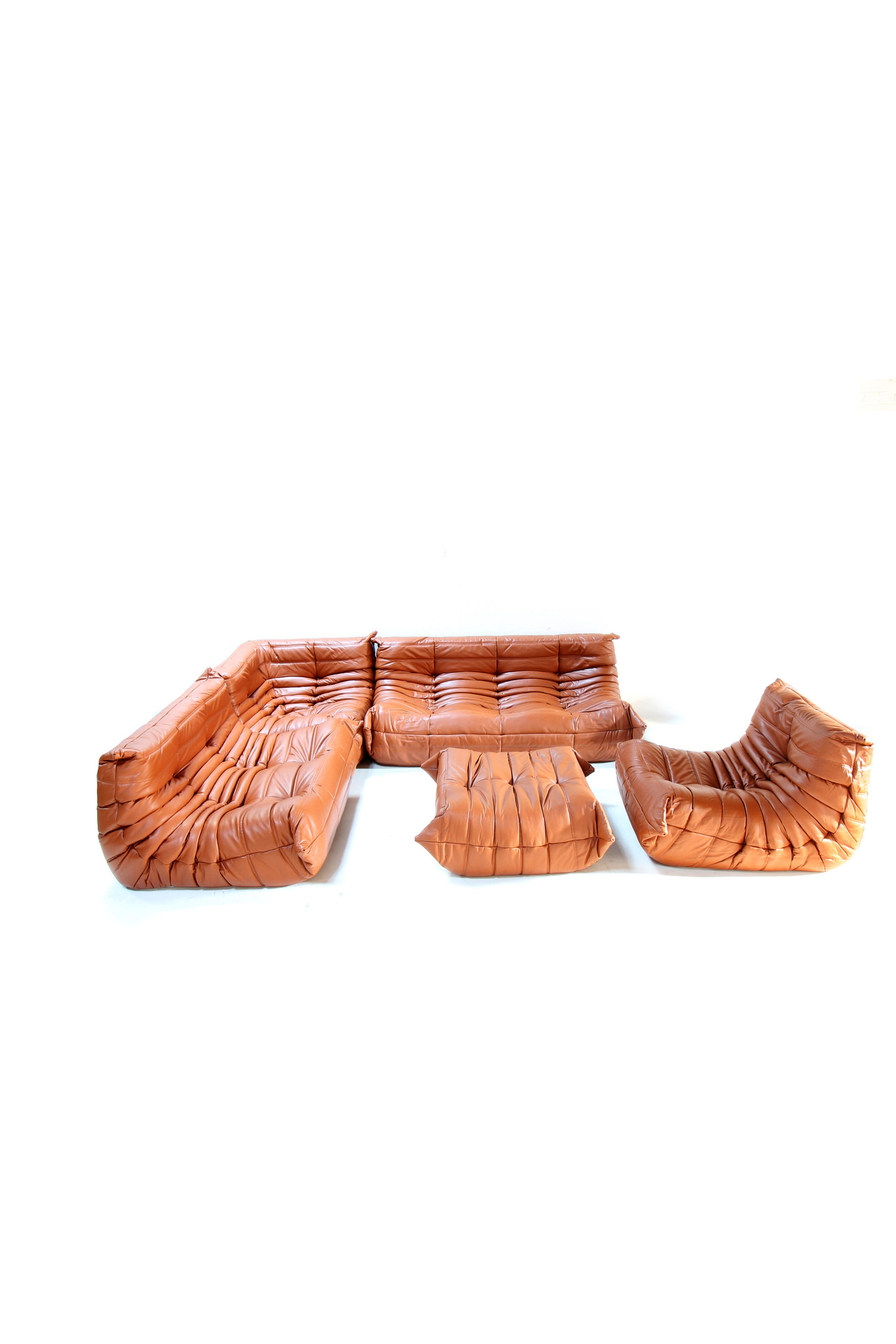 Ligne roset togo in cognac leather - THE HOUSE OF WAUW