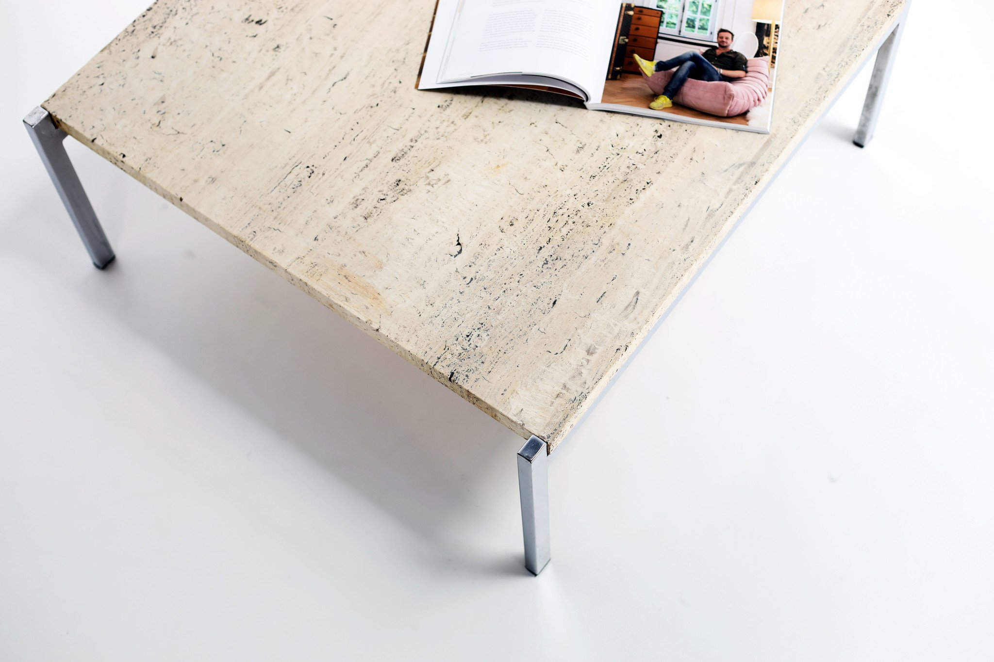 Sober vintage coffee table with travertine top