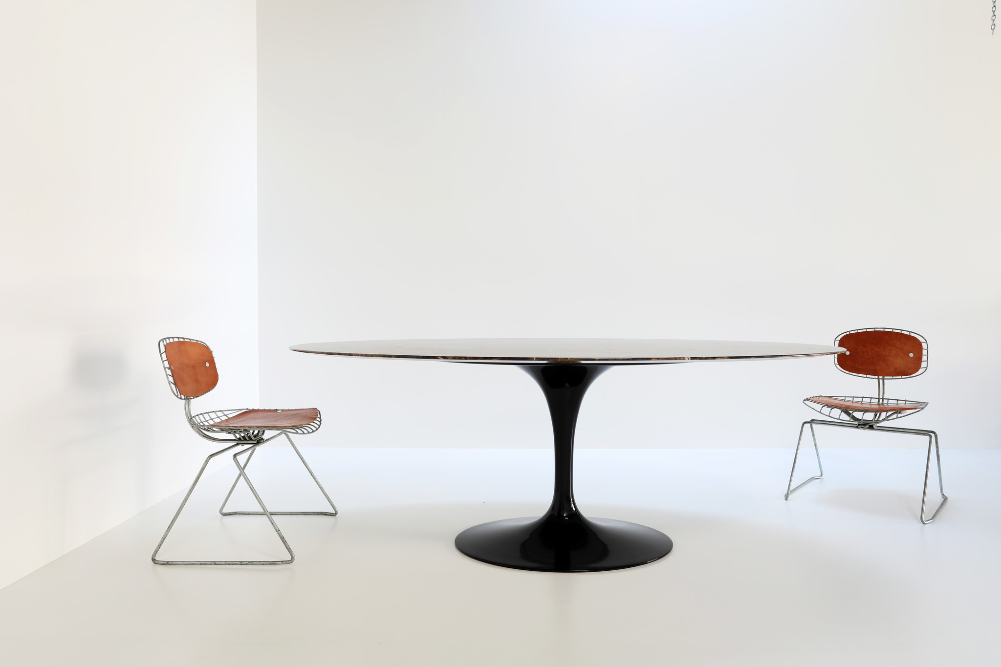 Eero Saarinen oval Knoll table with Emperador marble