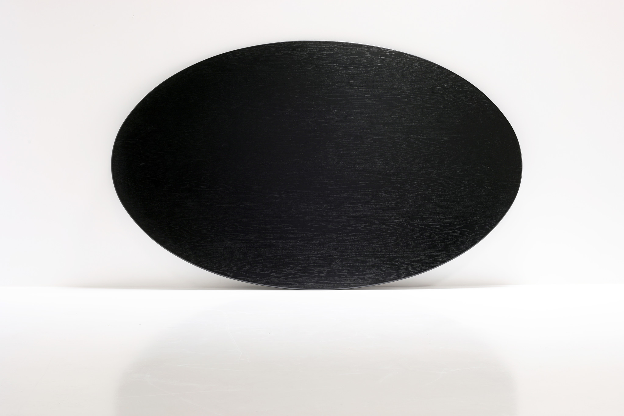 Eero Saarinen oval table with ebonized oak for Knoll