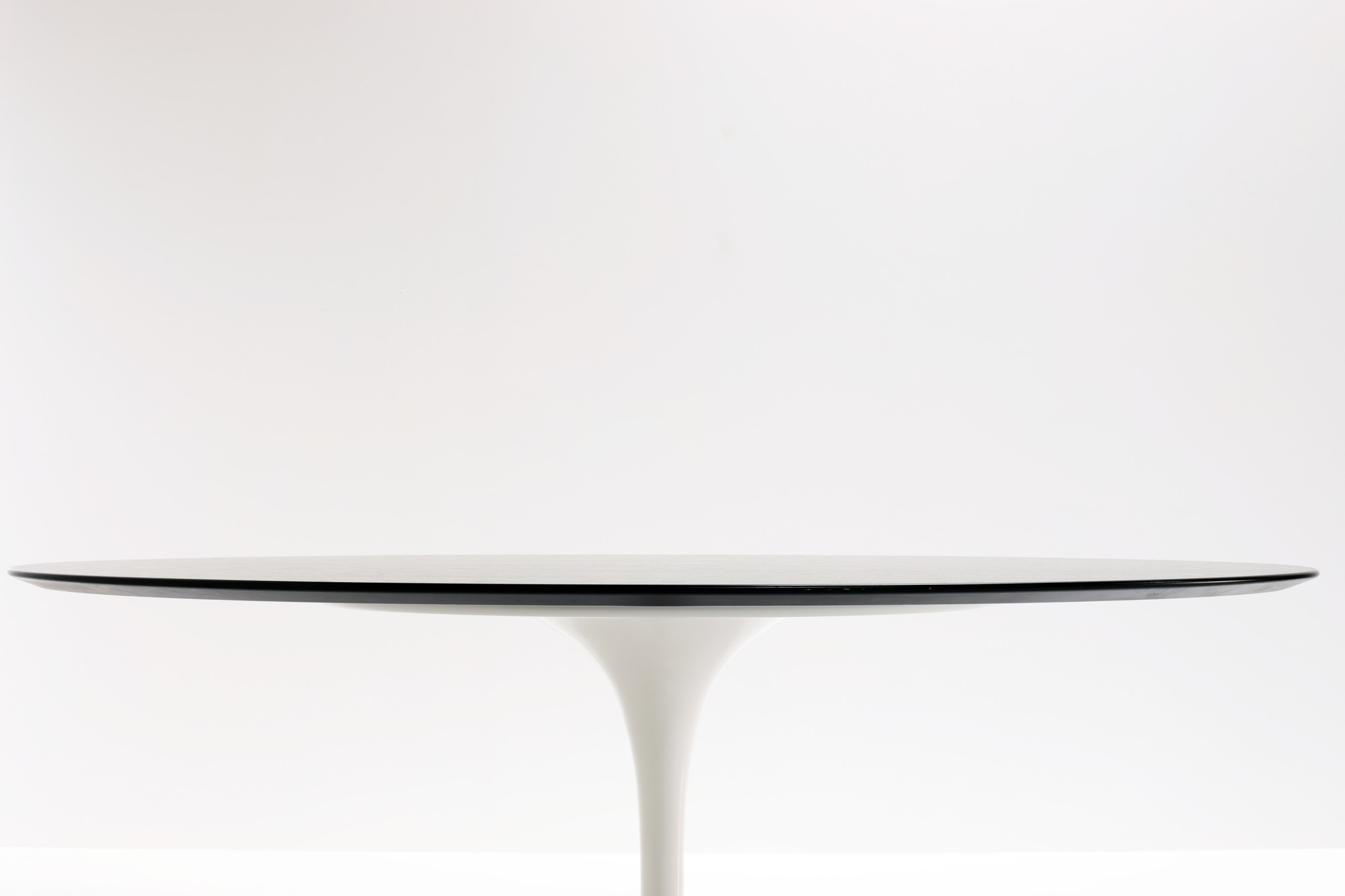 Eero Saarinen oval table with ebonized oak for Knoll