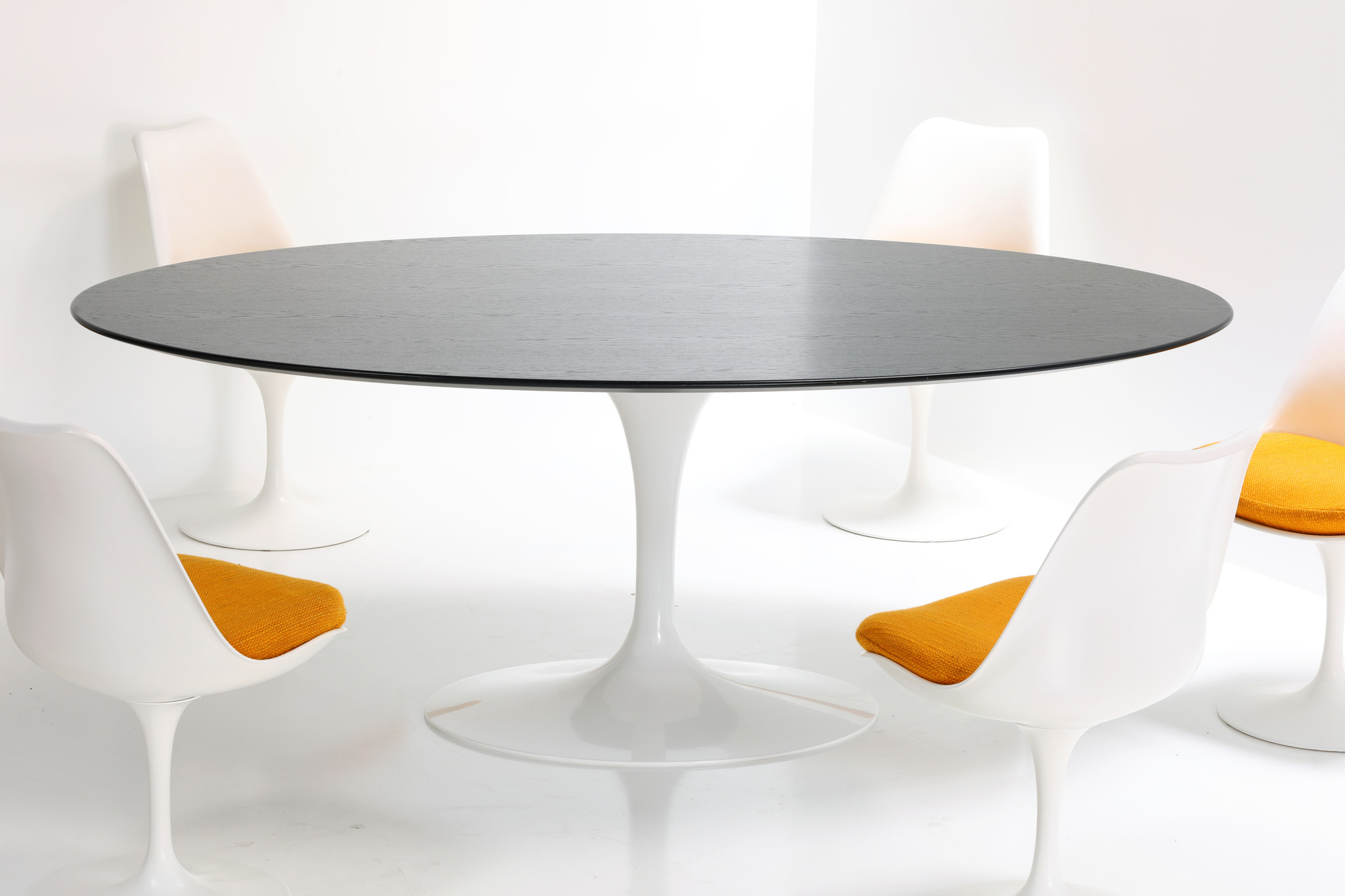 Eero Saarinen oval table with ebonized oak for Knoll