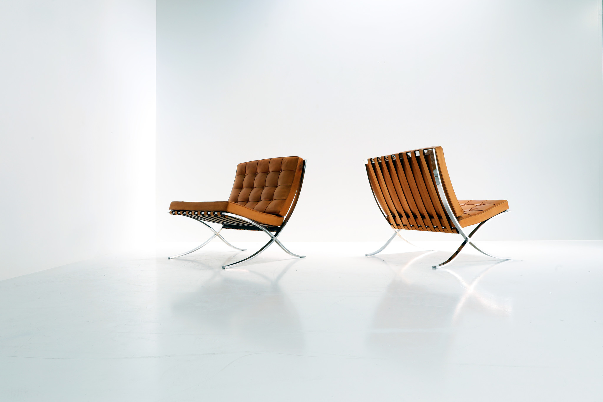 PAIR OF VINTAGE BARCELONA CHAIRS BY LUDWIG MIES VAN DER ROHE