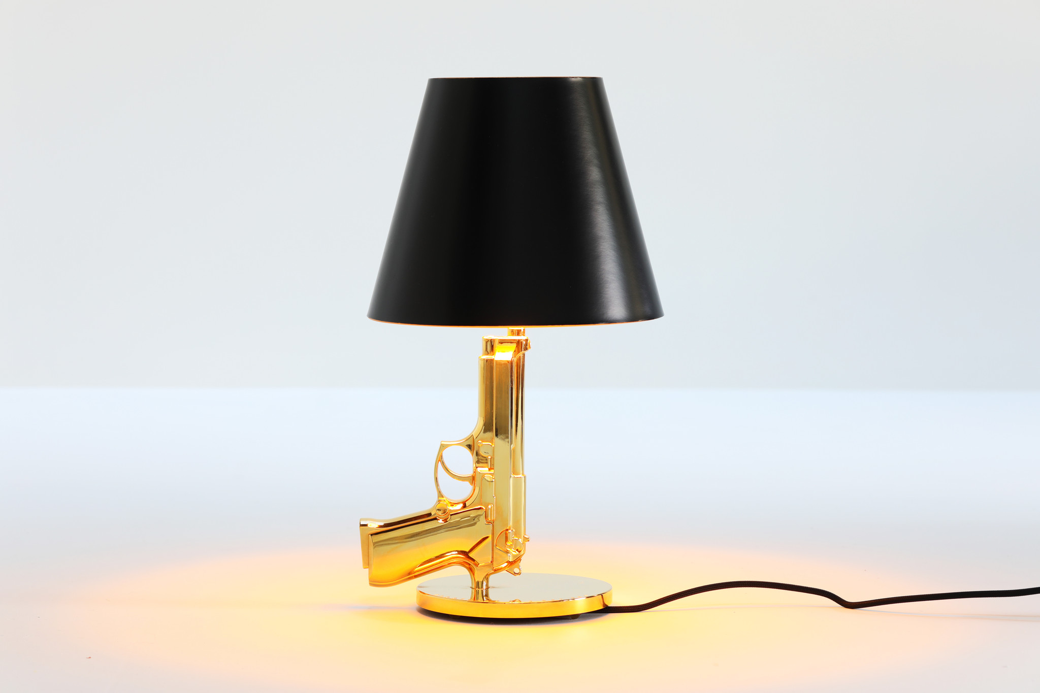 Gun table lamp by Philippe Starck for FLOS