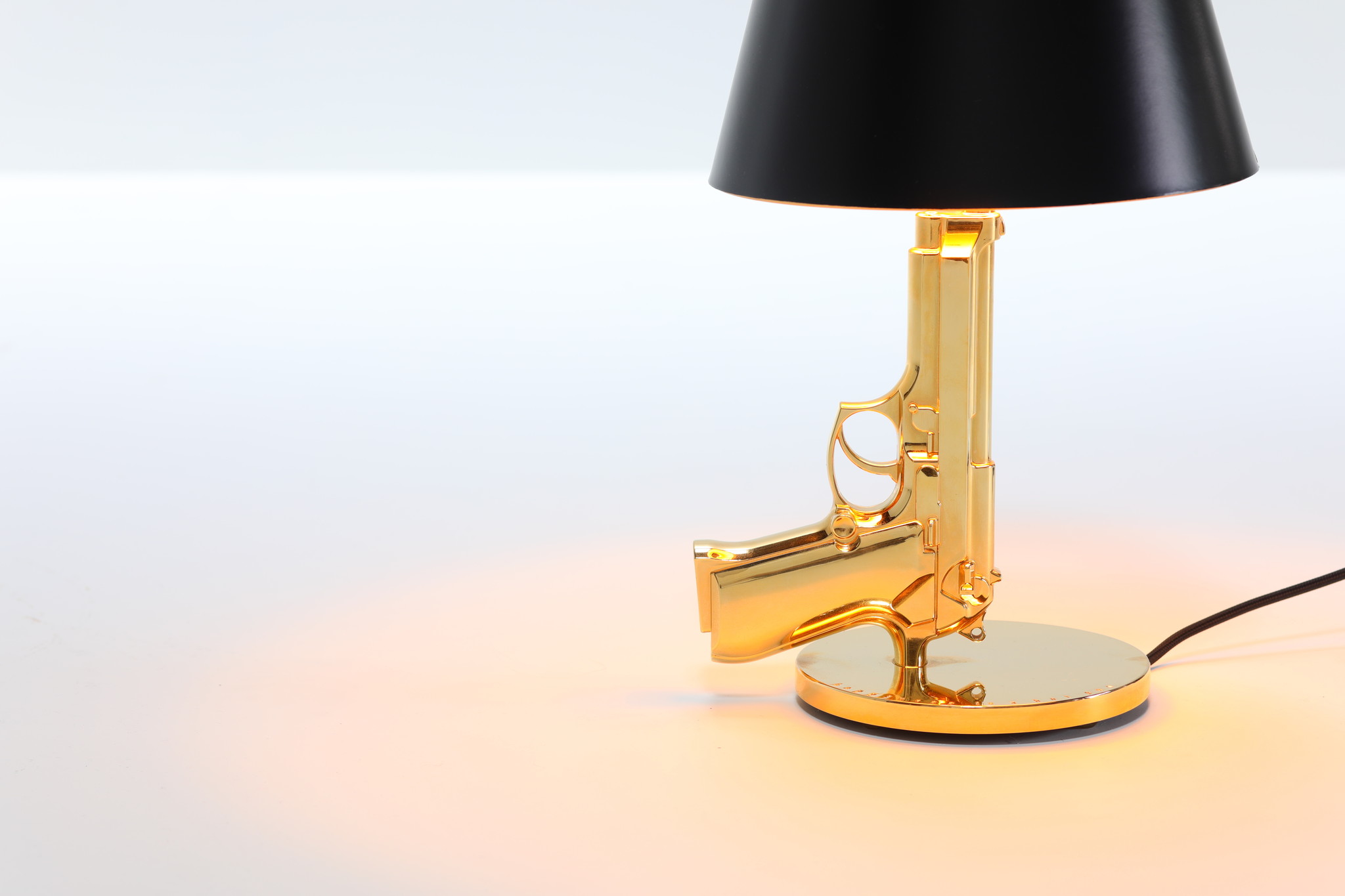 Gun table lamp by Philippe Starck for FLOS