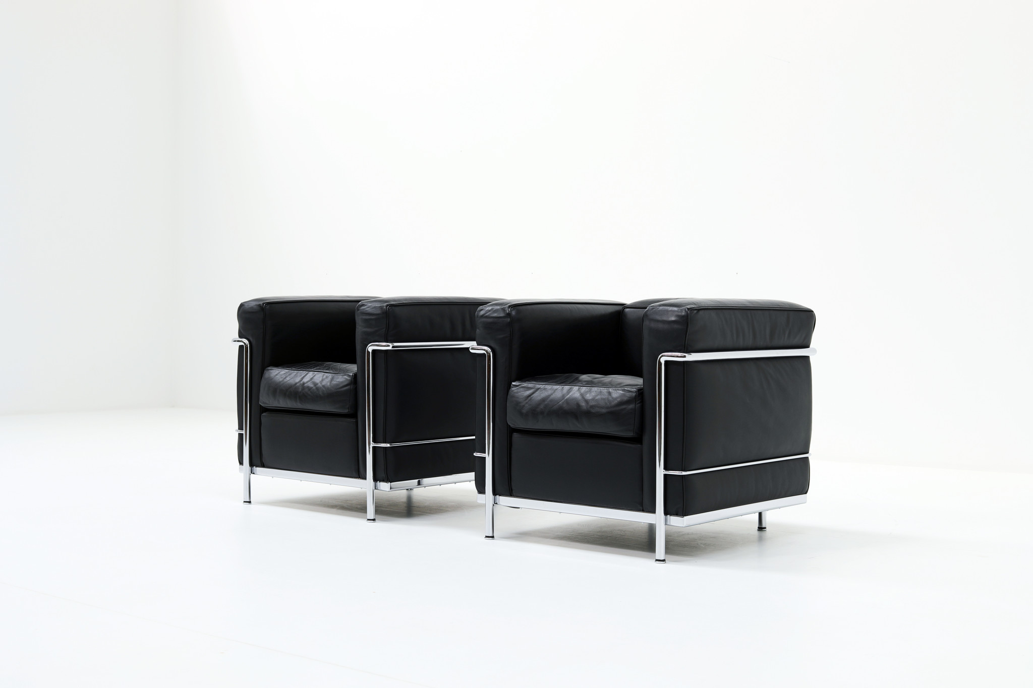 Vintage Couple black Le Corbusier LC2 1-seater for Cassina