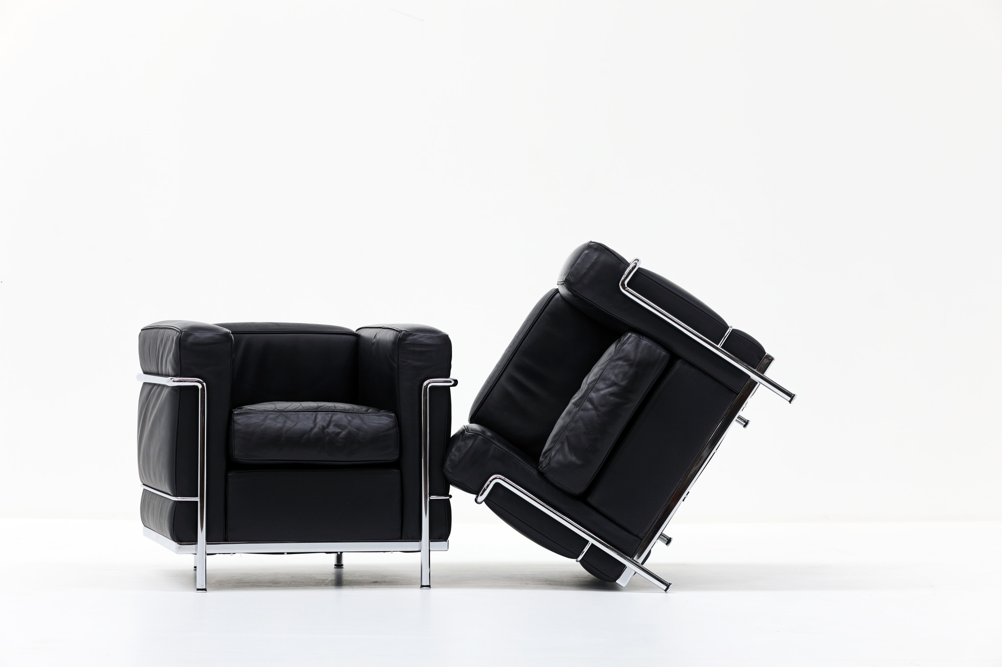 Vintage Couple black Le Corbusier LC2 1-seater for Cassina