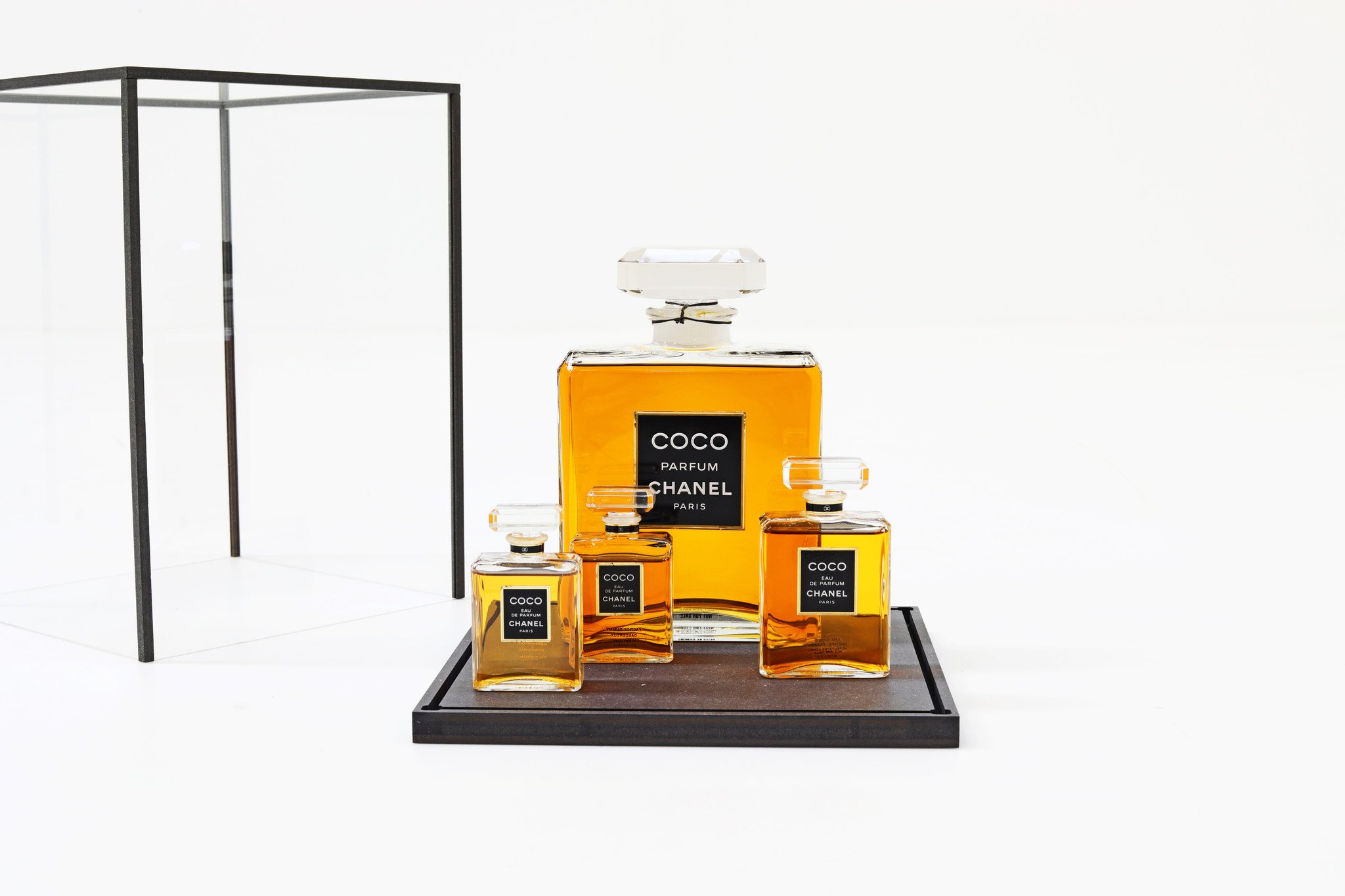 Chanel Coco Collection bottles in display case