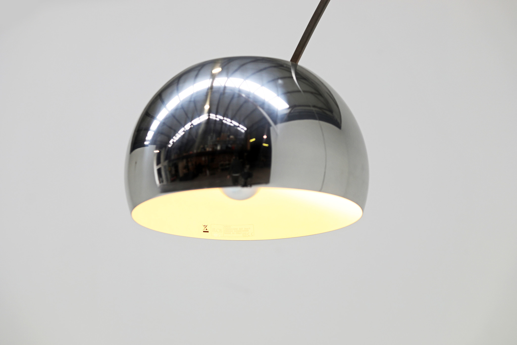 Flos booglamp ontwerpen door Archille en Piere Castiglioni, 1962