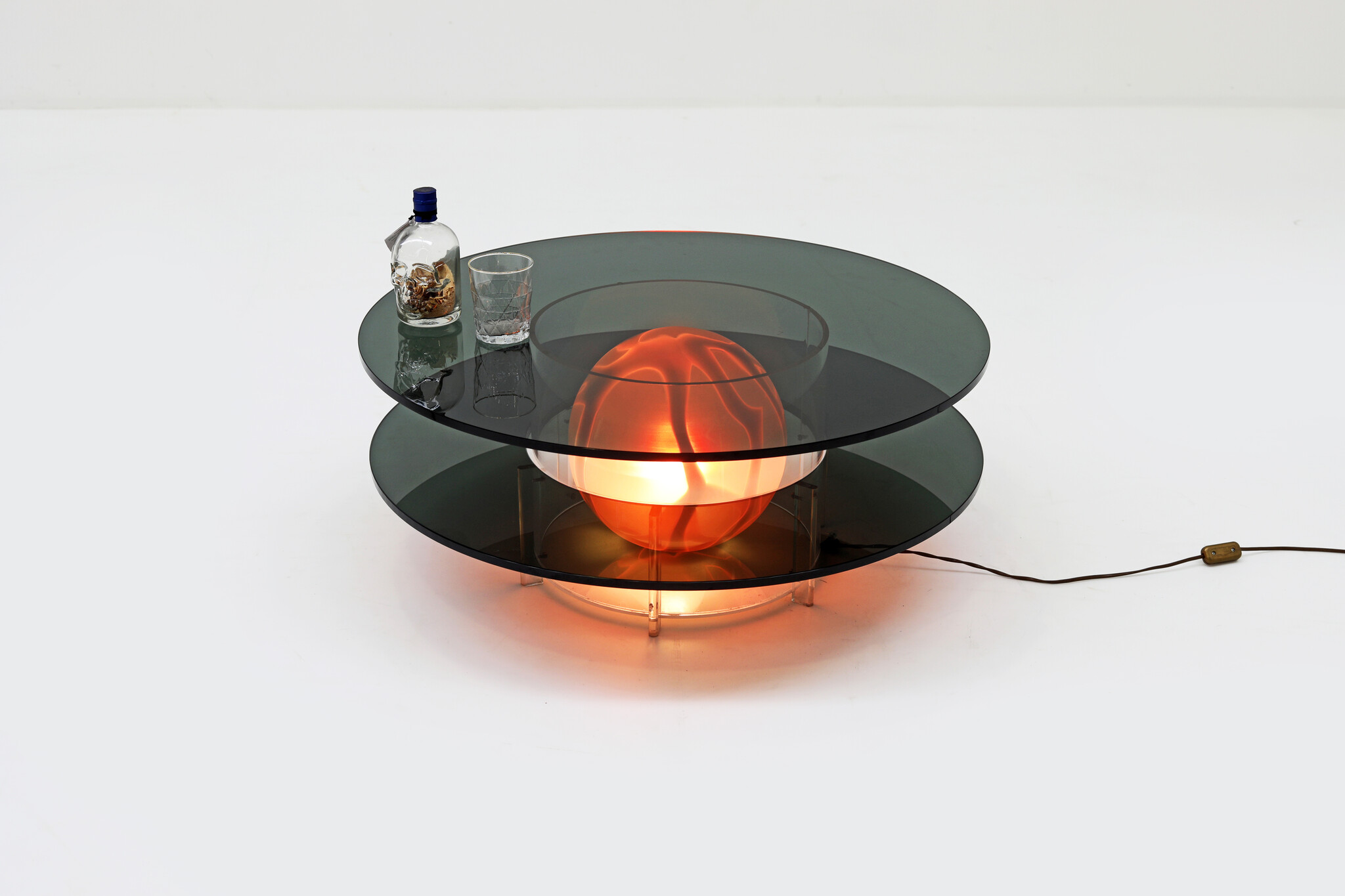 Italian Space Age coffee table in smoked glass with Murano globe lamp, 1970's