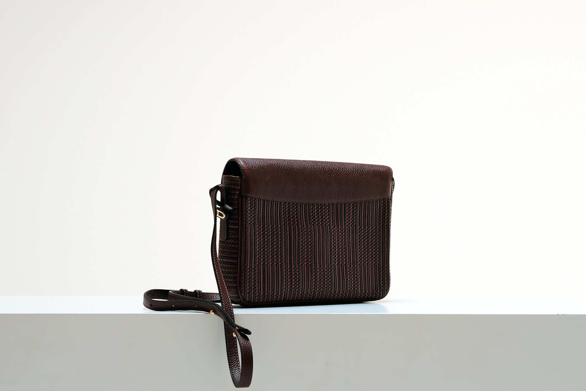 Delvaux “Toile de Cuir” crossbody bag