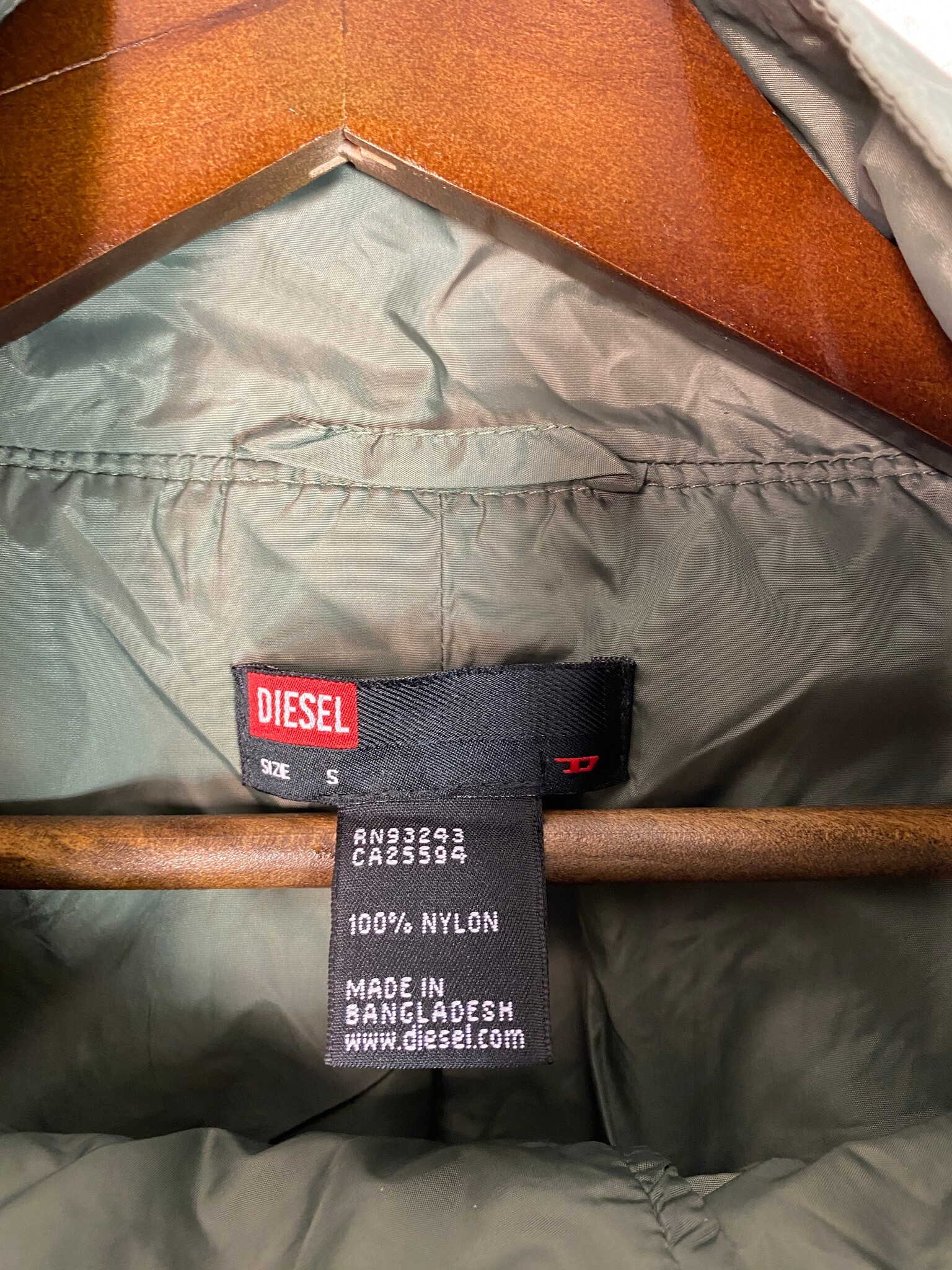 Diesel jack kaki met turquoise strepen en asymmetrische rits
