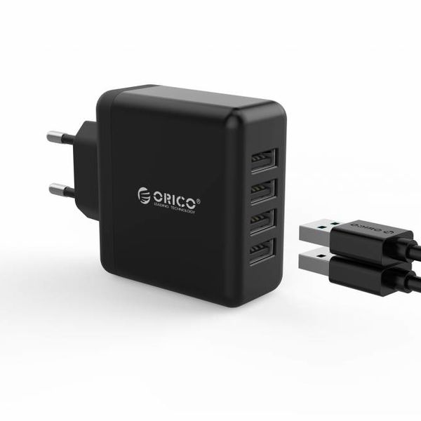 Orico Kompaktes Reise- / Heimladegerät mit 4x USB-Ladeanschlüssen - 5V-2,4 pro Anschluss - IC-Chip - Schwarz
