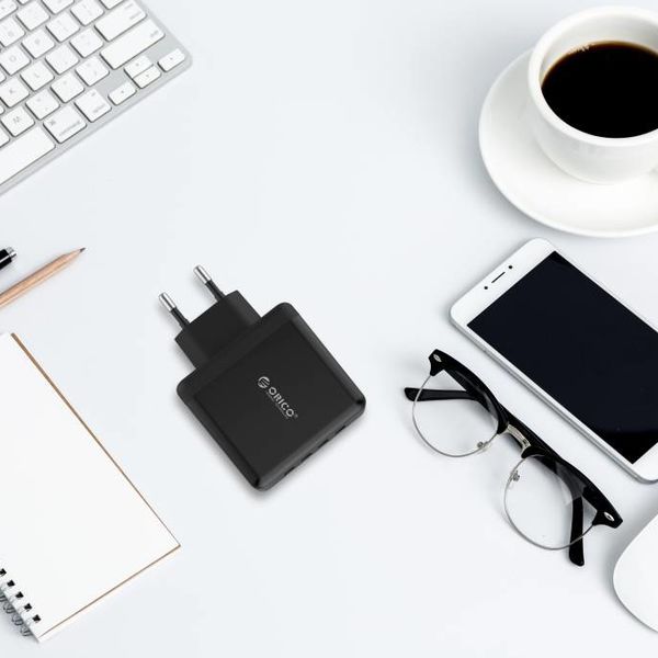 Orico Chargeur de voyage / maison compact avec 4 ports de chargement USB - 5V-2.4 par port - IC Chip - Noir
