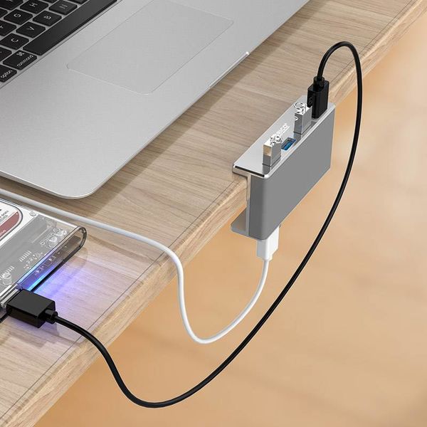 Orico Aluminium USB 3.0 Hub mit Clip-on Design - 4 USB Typ-A Ports - Klemmbereich 10 bis 32mm - 5 Gbps - Inkl. Datenkabel - Silber