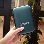 Orico Housse de protection portable / sac de protection pour un disque dur de 2,5 pouces - Comprend un espace pour les accessoires - Résistant à l'humidité, à la poussière et antistatique - Bleu