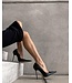 Gabriela in den Cruella-Pumps