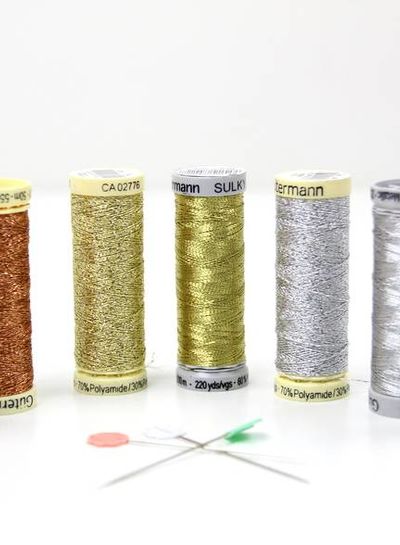 Gutermann glitter silver 50m