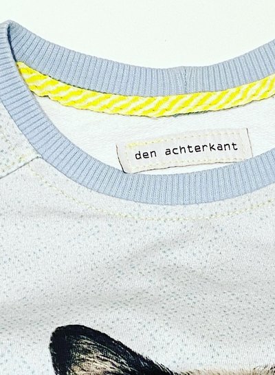 Madeline 6 labels "den achterkant"
