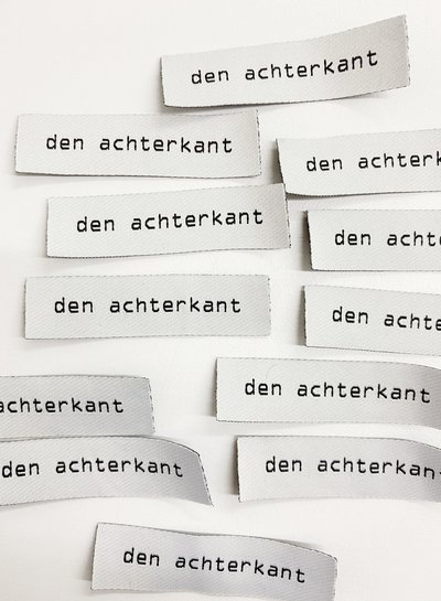 Madeline 6 labels "den achterkant"