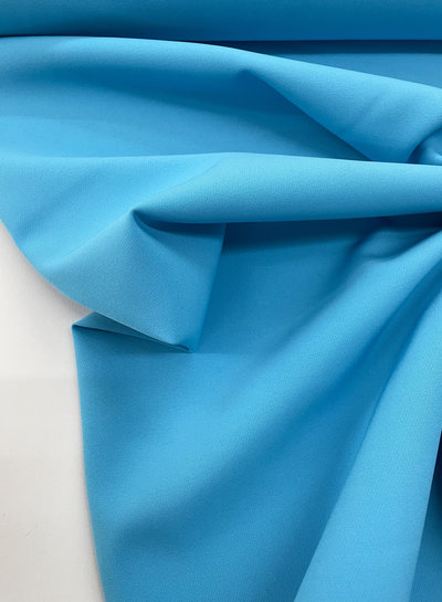 A la Ville aqua blauw - klassevolle doorvallende broekenstof