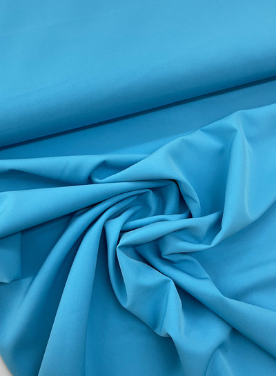 A la Ville aqua blauw - klassevolle doorvallende broekenstof