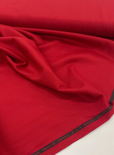 red - woven bamboo - recycled, very supple fabric and does not wrinkle