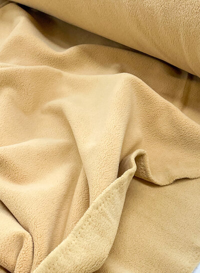 M. camel - comfort stretch fleece - good stretch, comparable to jogging