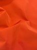 Madeline hermès orange trench coat fabric